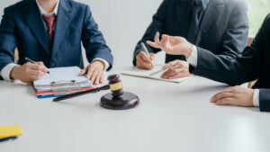Lawyer and agent meeting regarding the client's plea