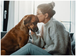 Owner showing love for her dog