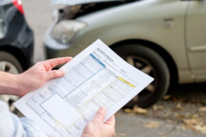 person reading an accident report