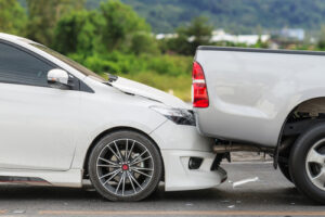 car has rear-ended a pickup truck