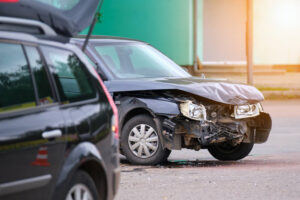 Car accident happening along the intersection.