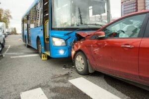 Head-on collision between bus and car.