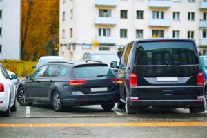 Car accident in tight parking lot.